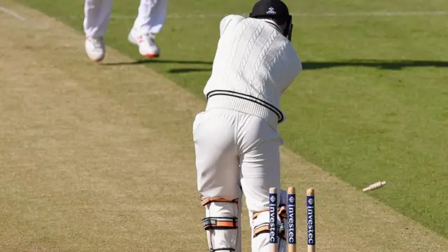 Mark Wood takes the wicket of BJ Watling