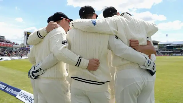 New Zealand fielders huddle