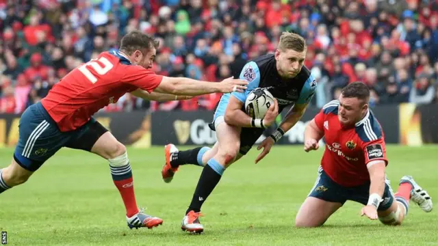 Finn Russell spots a gap in the Irish defence and darts through to cross for Glasgow's fourth try