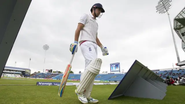 Alastair Cook walks