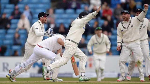 Tom Latham, Luke Ronchi and Brendon McCullum of New Zealand appeal