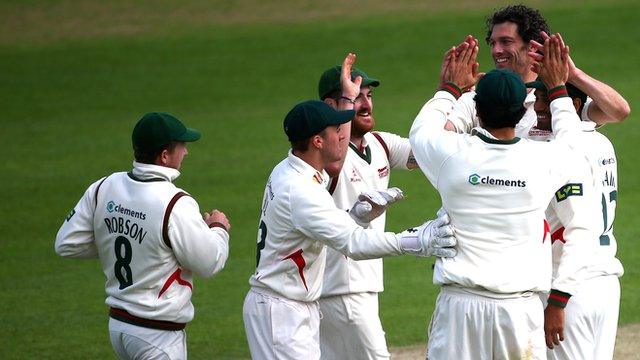 Charlie Shreck is congratulated after taking a wicket in Leicestershire's win over Essex