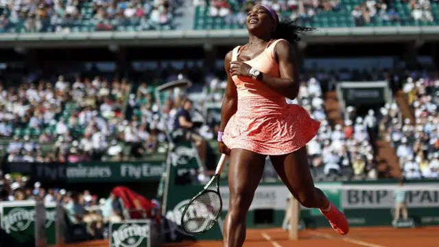 Serena Williams reacts after a shot