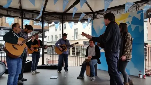 mylittlebrother playing on the bandstand