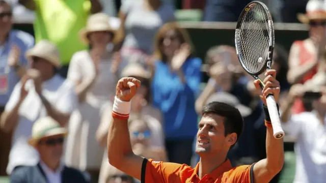 Novak Djokovic celebrates winning his match