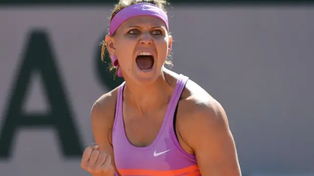 Lucie Safarova celebrates winning the set