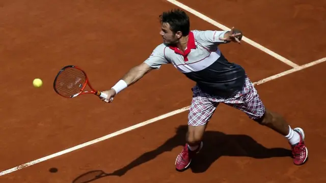 Stan Wawrinka plays a backhand