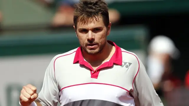 Stan Wawrinka celebrates breaking Djokovic