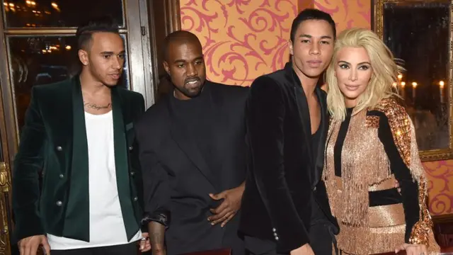 Lewis Hamilton (left), with Kanye West, Olivier Rousteing and Kim Kardashian