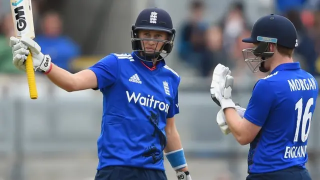 Joe Root celebrates his 50