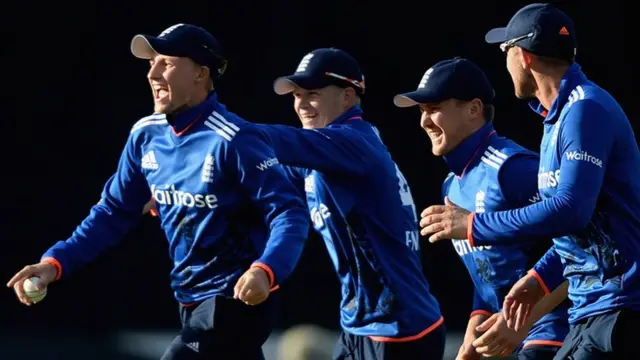 Joe Root celebrates with his teammates