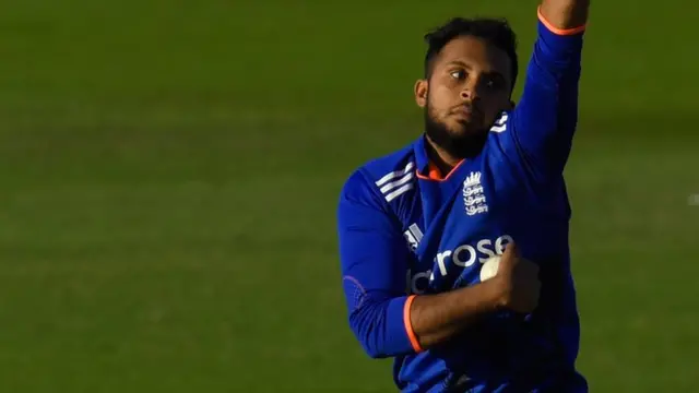 Adil Rashid bowls