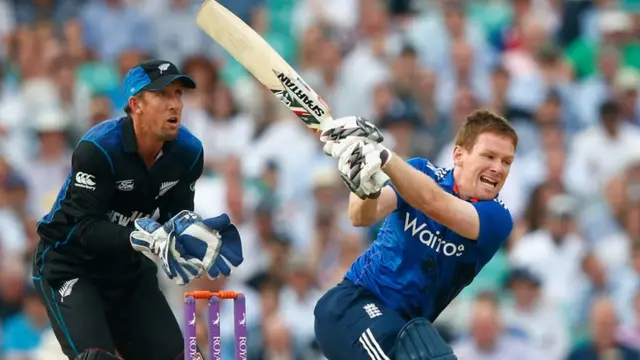 Eoin Morgan removes helmet