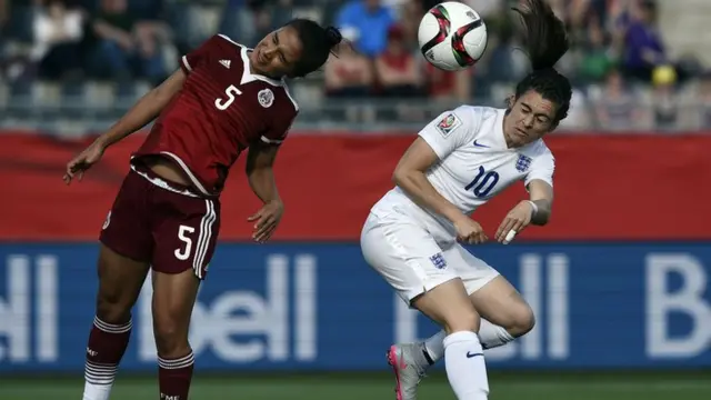 Karen Carney scores