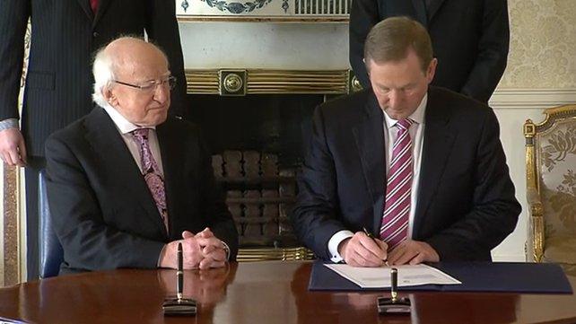 President Michael D Higgins is asked to dissolve parliament by Prime Minister (Taoiseach) Enda Kenny