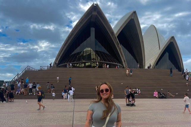 Girl outside The Sydney Opera House