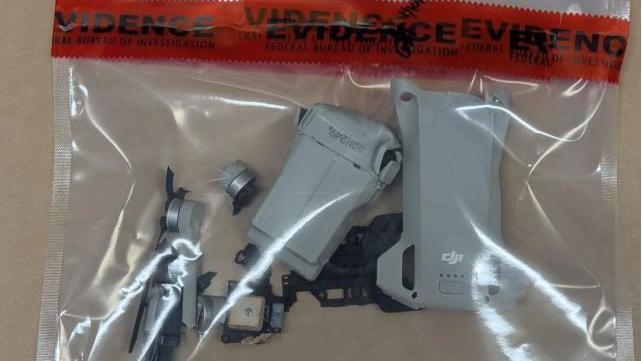 Pieces of drone in an evidence bag