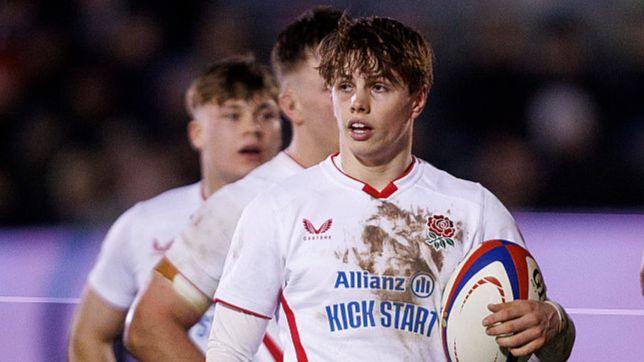 Scrum-half Lucas Friday holds the ball during a break in play