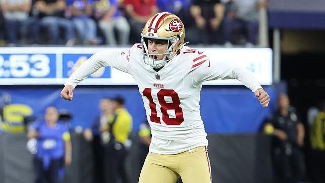 Eddy Pineiro celebrating a field goal against the Los Angeles Rams