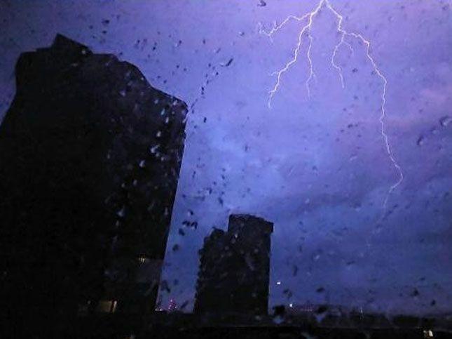 Lightning lights up the night sky in Chelsea, Greater London