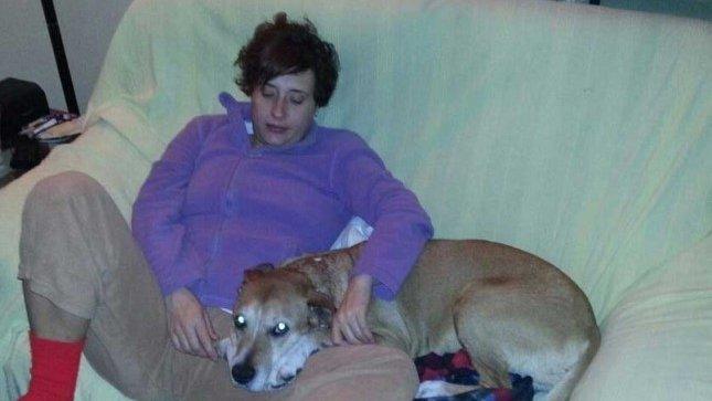 Teresa Romero Ramos, the Spanish nurse who contracted Ebola, is pictured with her dog Excalibur in this undated handout photo provided on 8 October 2014