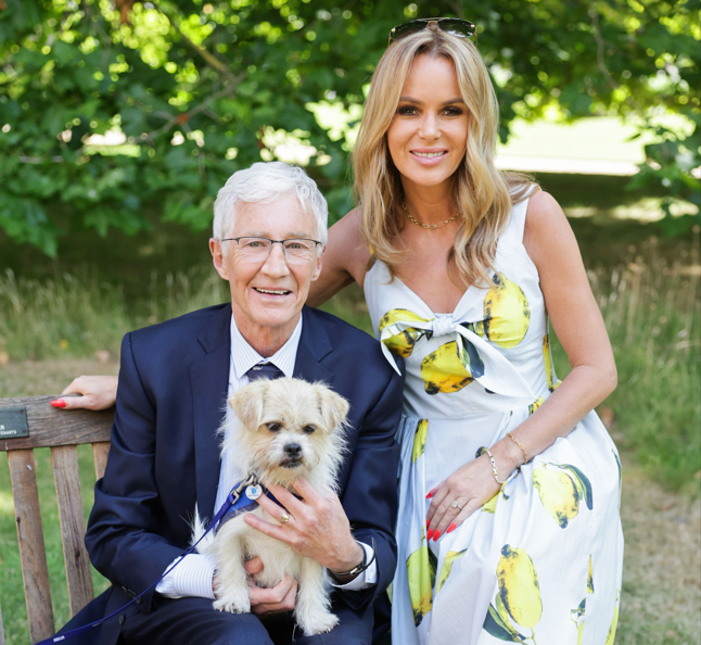 Paul O'Grady and Amanda Holden with a dog at the reception