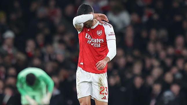 Mikel Merino covering his face