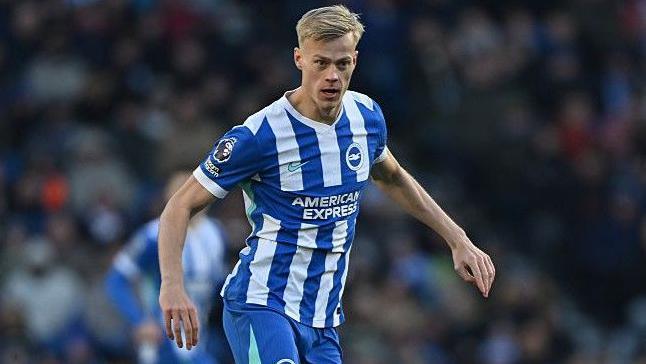 Jan Paul van Hecke in action for Brighton