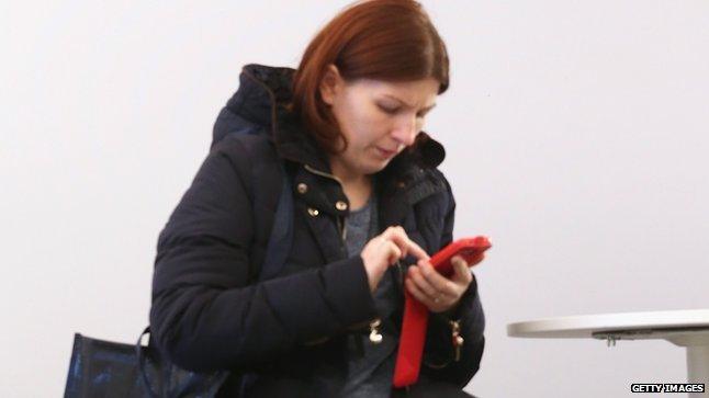 Woman using mobile phone