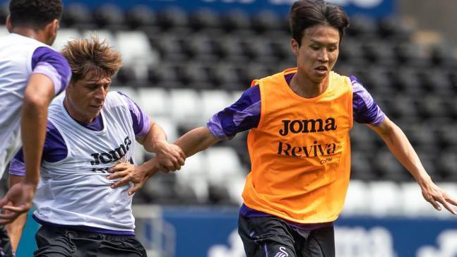 Goncalo Franco and Eom Ji-Sung during Swansea training