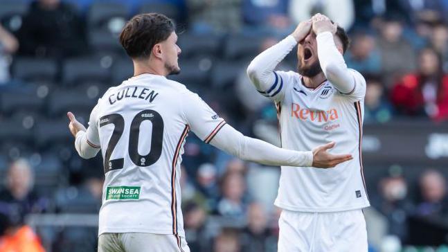 Liam Cullen and Matt Grimes show their frustration after the Swansea captain's shot was blocked against Millwall 