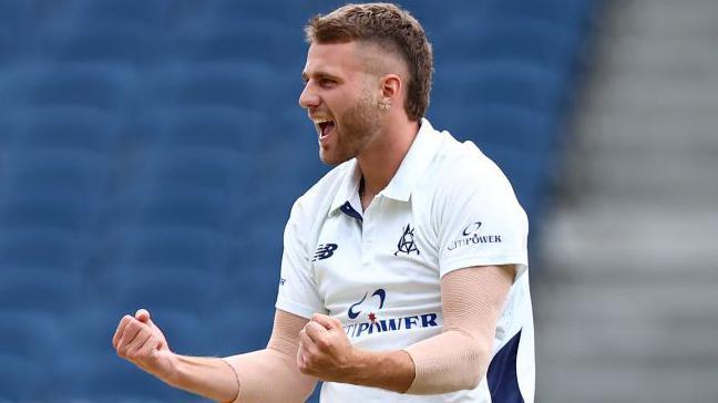 Fergus O'Neill of Victoria celebrates taking the wicket of Angus Lovell of Queensland during the Sheffield Shield match between Victoria and Queensland at Melbourne Cricket Ground, on December 07, 2024, in Melbourne, Australia.