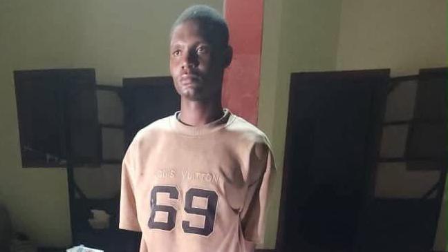 Arrested Nigerian Army Private Mohammed Yusuf wearing a T shirt with 69 written on it