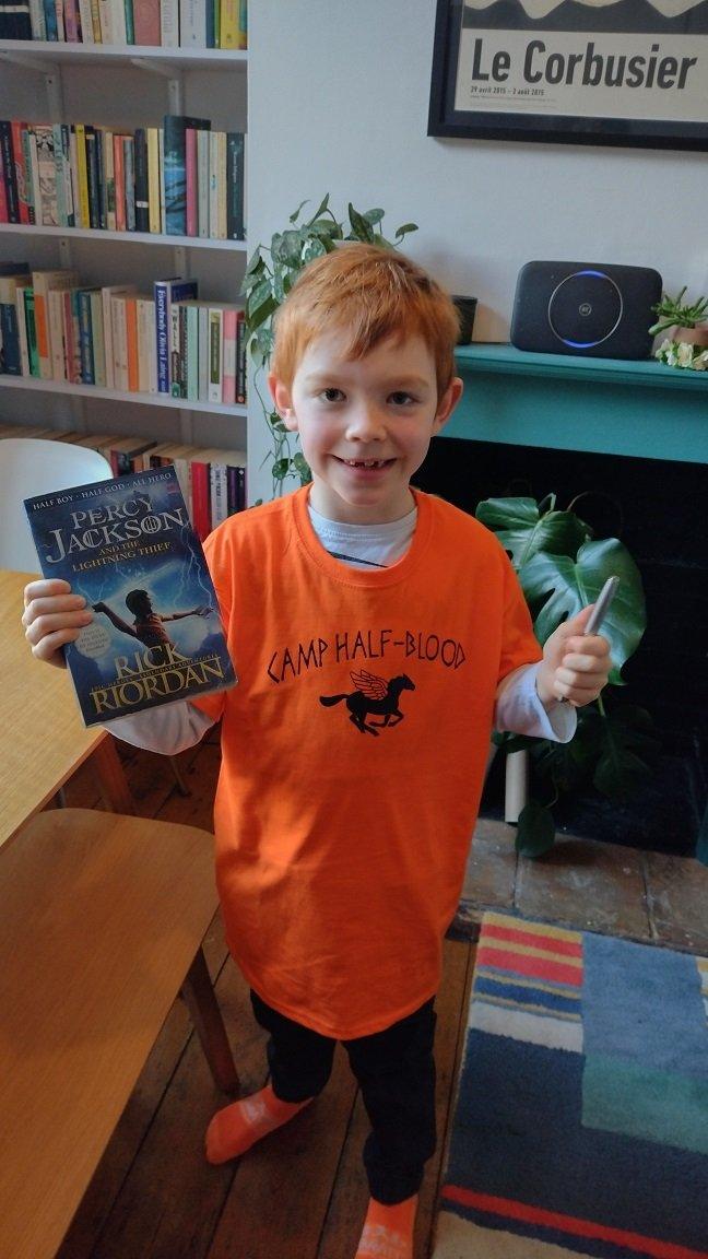 boy dressed up as percy jackson