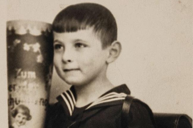 Sepia head shot of Manfred Davidmann when he was aged six