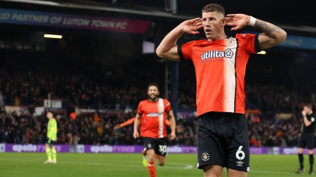 Ross Barkley of Luton Town celebrates after scoring against Arsenal in December