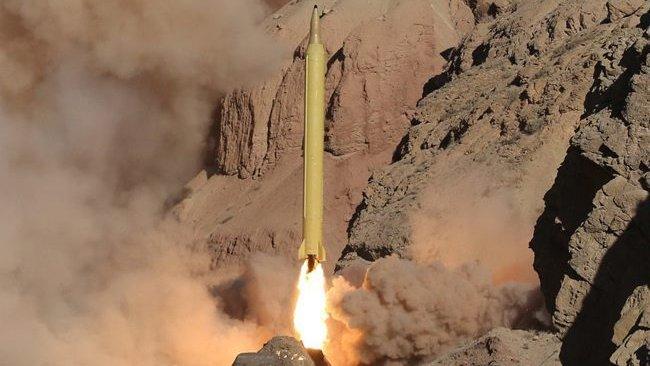 Handout picture from Iran's revolutionary guards shows long range missile Qadr launched at undisclosed location in Iran, 9 March 2016