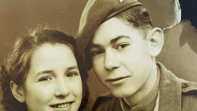 An old black and white sepia tinted photograph of Mr Blackwood and his wife Hanna, in which he wears a military uniform and beret.