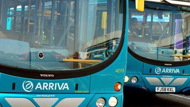 Close up shots of the fronts of two blue Arriva buses next to each other.
