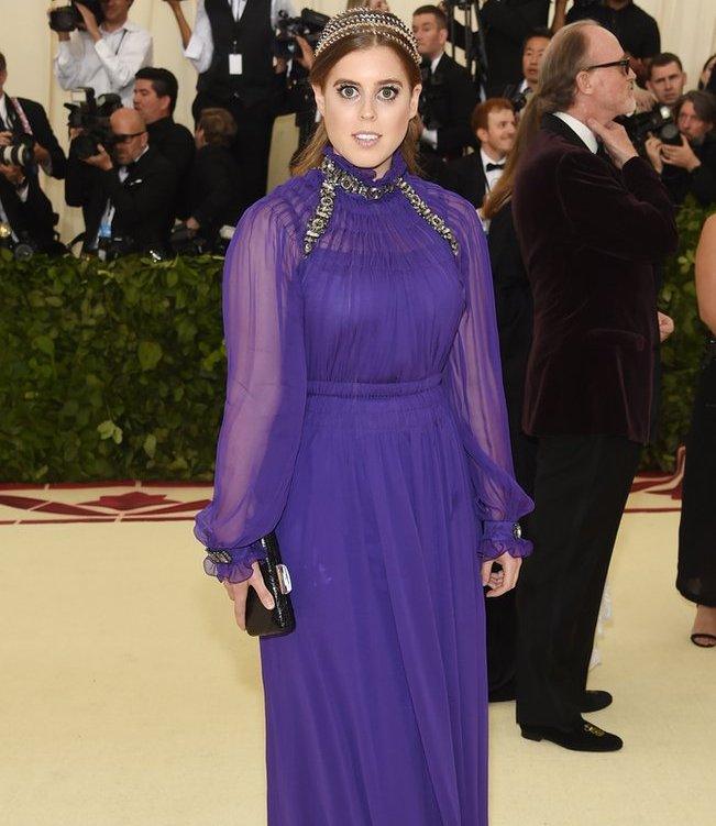 Princess Beatrice wears a floor-length purple gown at the New York Met Gala.