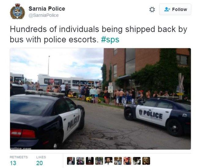 Sarnia Police tweet: "Hundreds of individuals being shipped back by bus with police escorts. #sps"