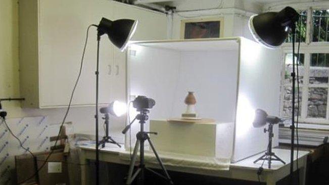 Ancient Egyptian artefact being photographed