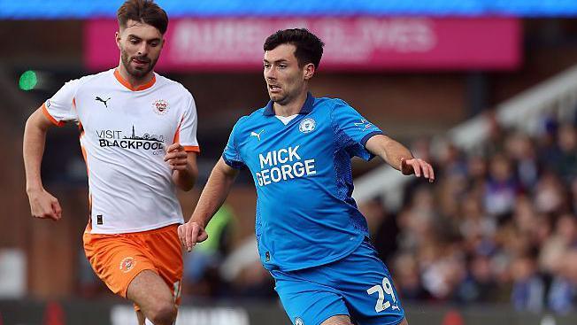 Peterborough United's Tom O'Connor (right)