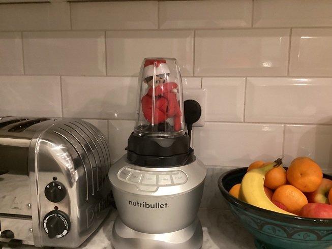 an elf in a smoothie maker