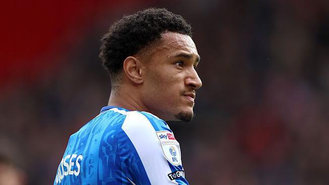 Sheffield Wednesday's Devlan Moses wearing a blue club shirt