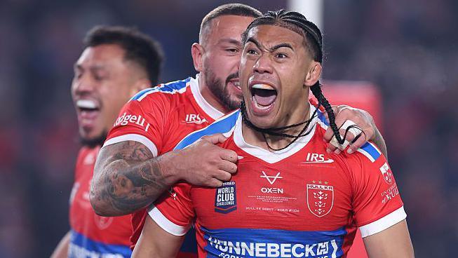 Hull KR player Tom Amone shouts in celebration after opening the scoring against Brisbane Broncos