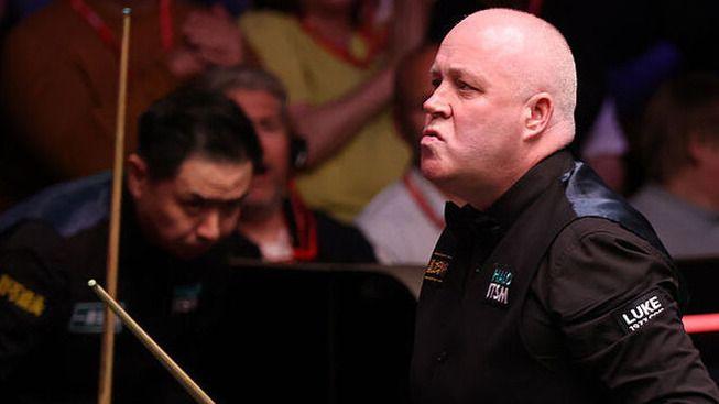 John Higgins around the table at the Crucible