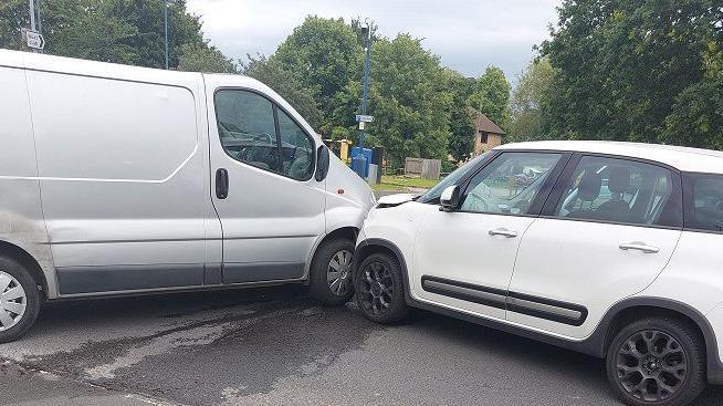 The van and car after Sunday's crash