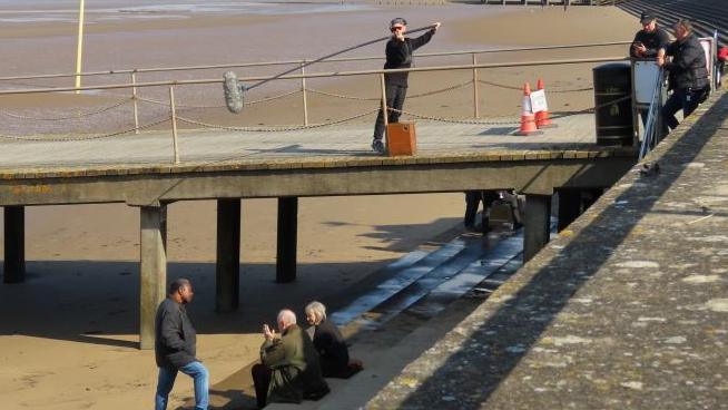 Actors by the jetty at Burnham-on-Sea.