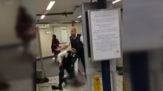 Police detain man at Leytonstone tube station